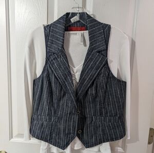 Level 99 pinstripes vest with white blouse